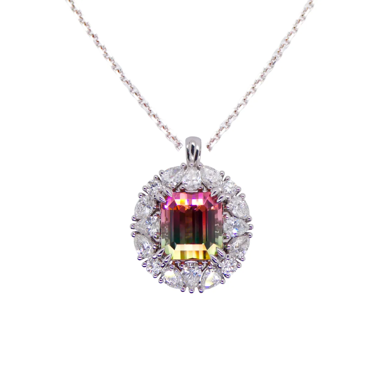18ct White Gold Emerald Cut Cantaloupe Tourmaline Pendant with Pear Cut Diamond Halo