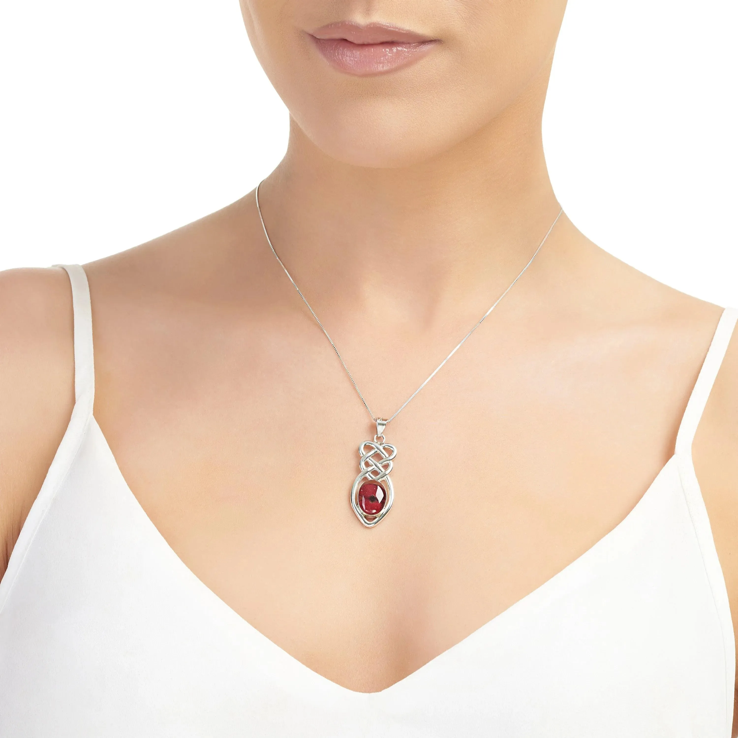 Celtic knot poppy necklace by  Shrieking Violet® Sterling silver chain & celtic pendant with real flowers. Handmade & unusual silver jewellery