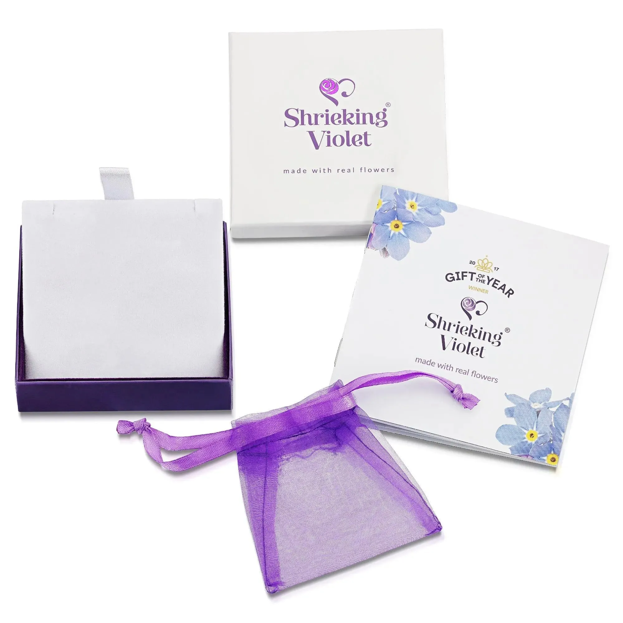 Celtic knot poppy necklace by  Shrieking Violet® Sterling silver chain & celtic pendant with real flowers. Handmade & unusual silver jewellery