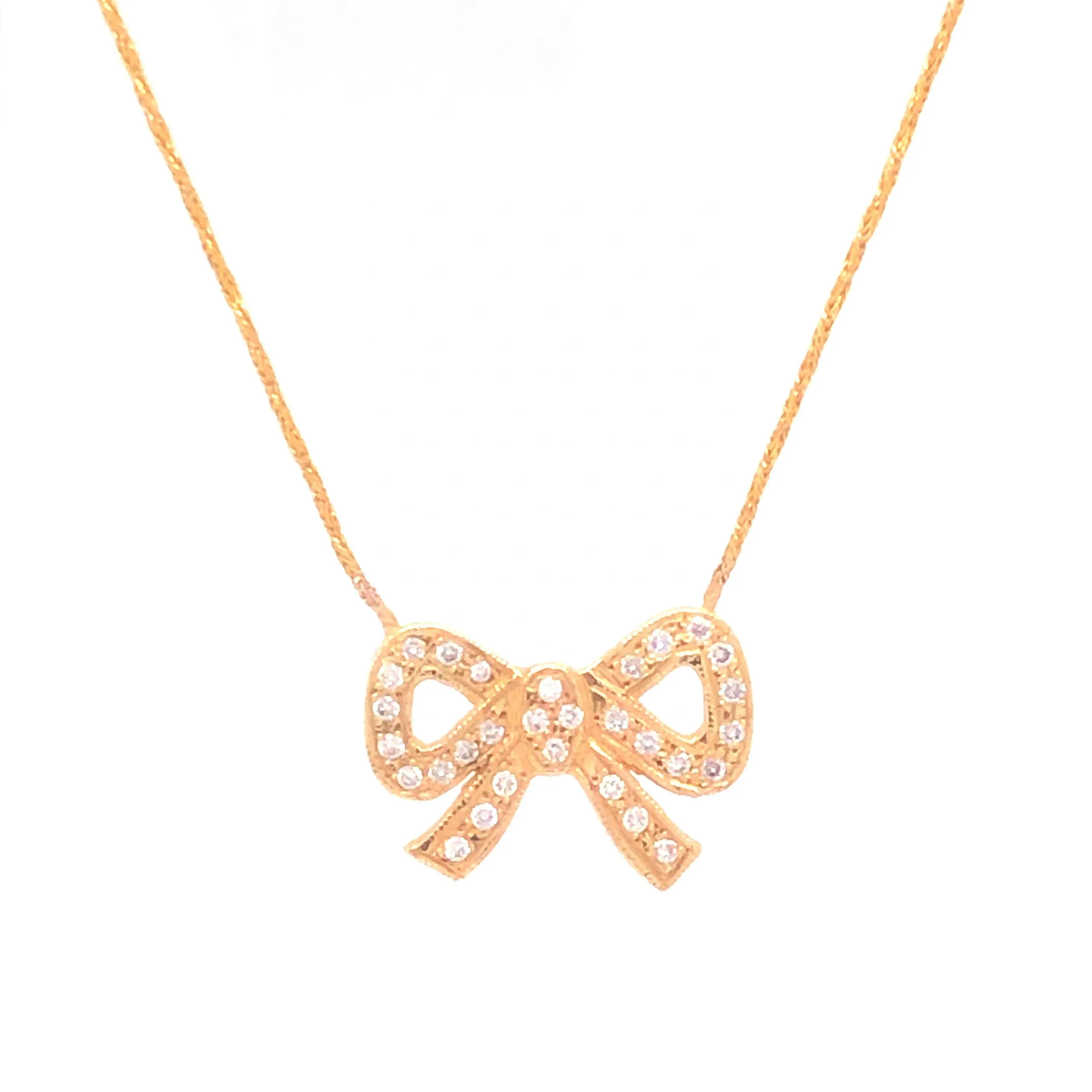 Diamond Bow Pendant Necklace in 10K Yellow Gold