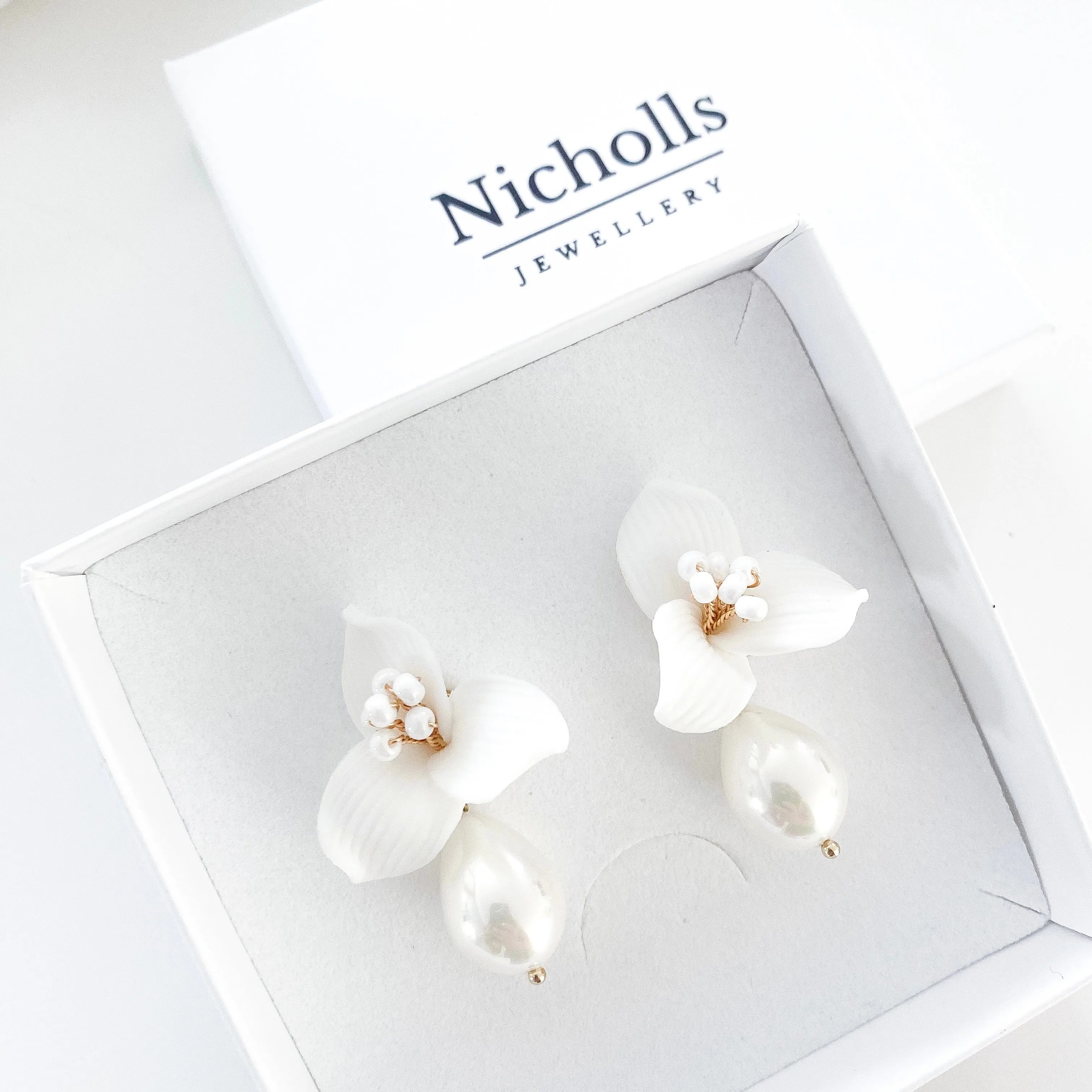 Pretty porcelain 3 petal flower and teardrop pearl earrings