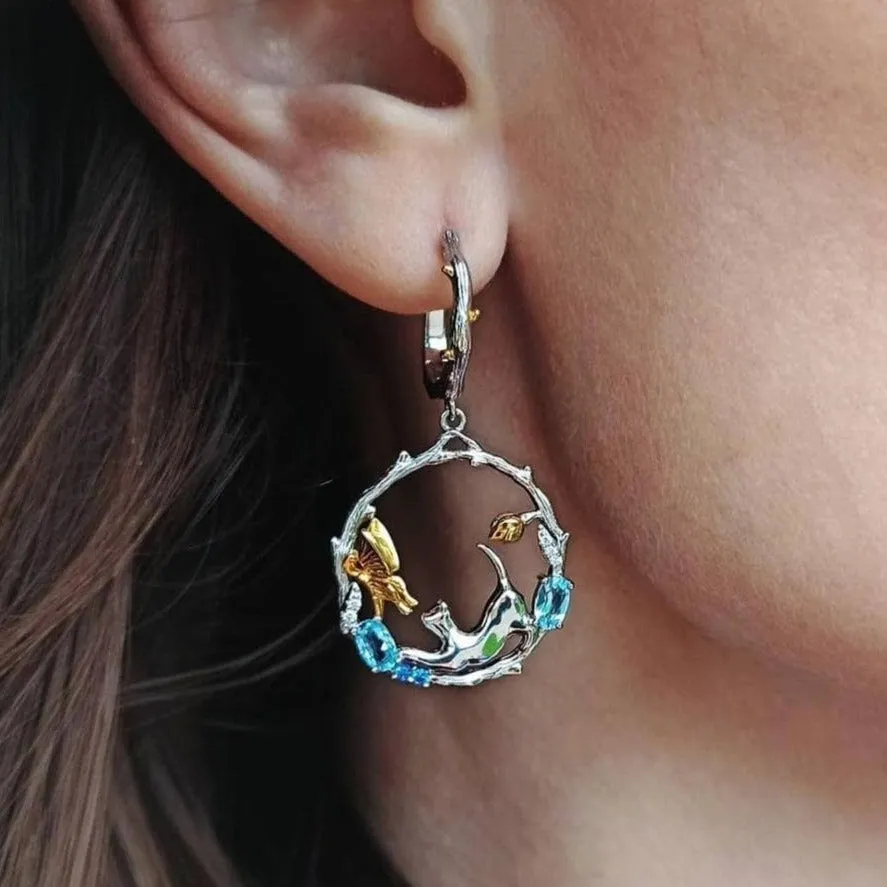 Swiss Blue Topaz Cat and Cupid Drop Earrings